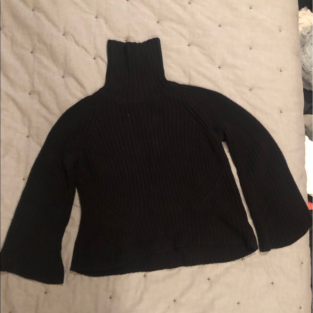 Black bell sleeved turtleneck sweater